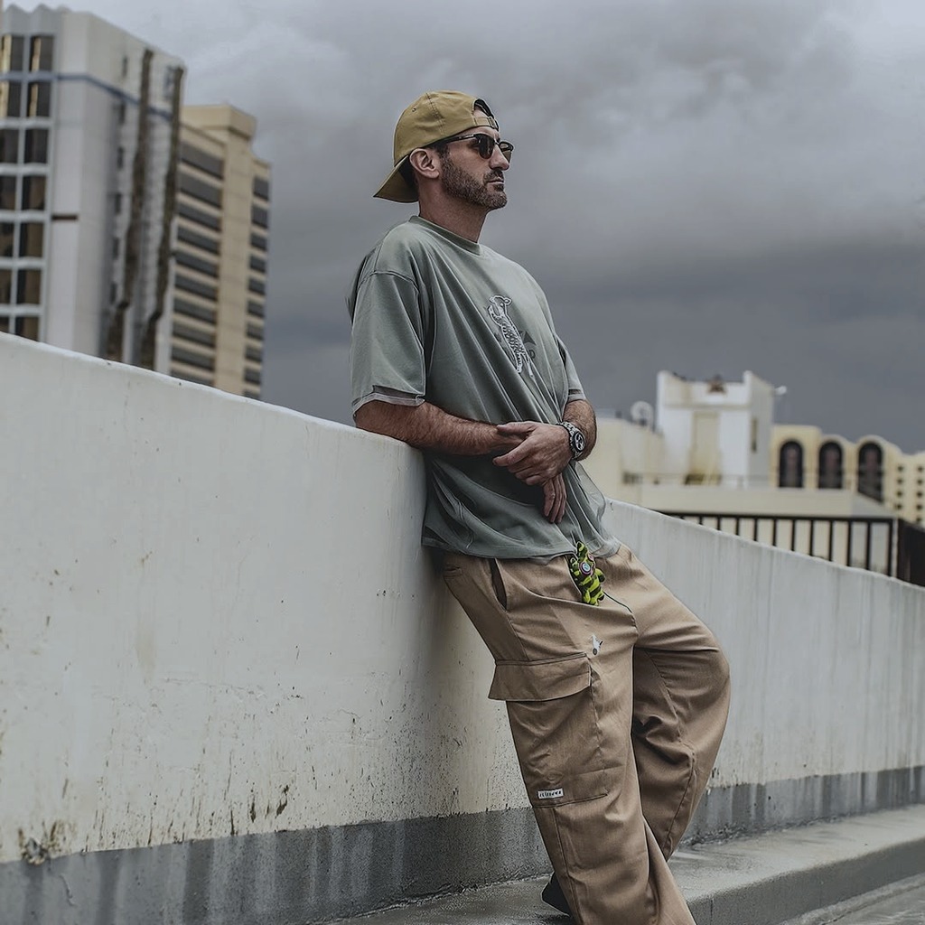 Founder Marcus Peyton on a rooftop under overcast skies
